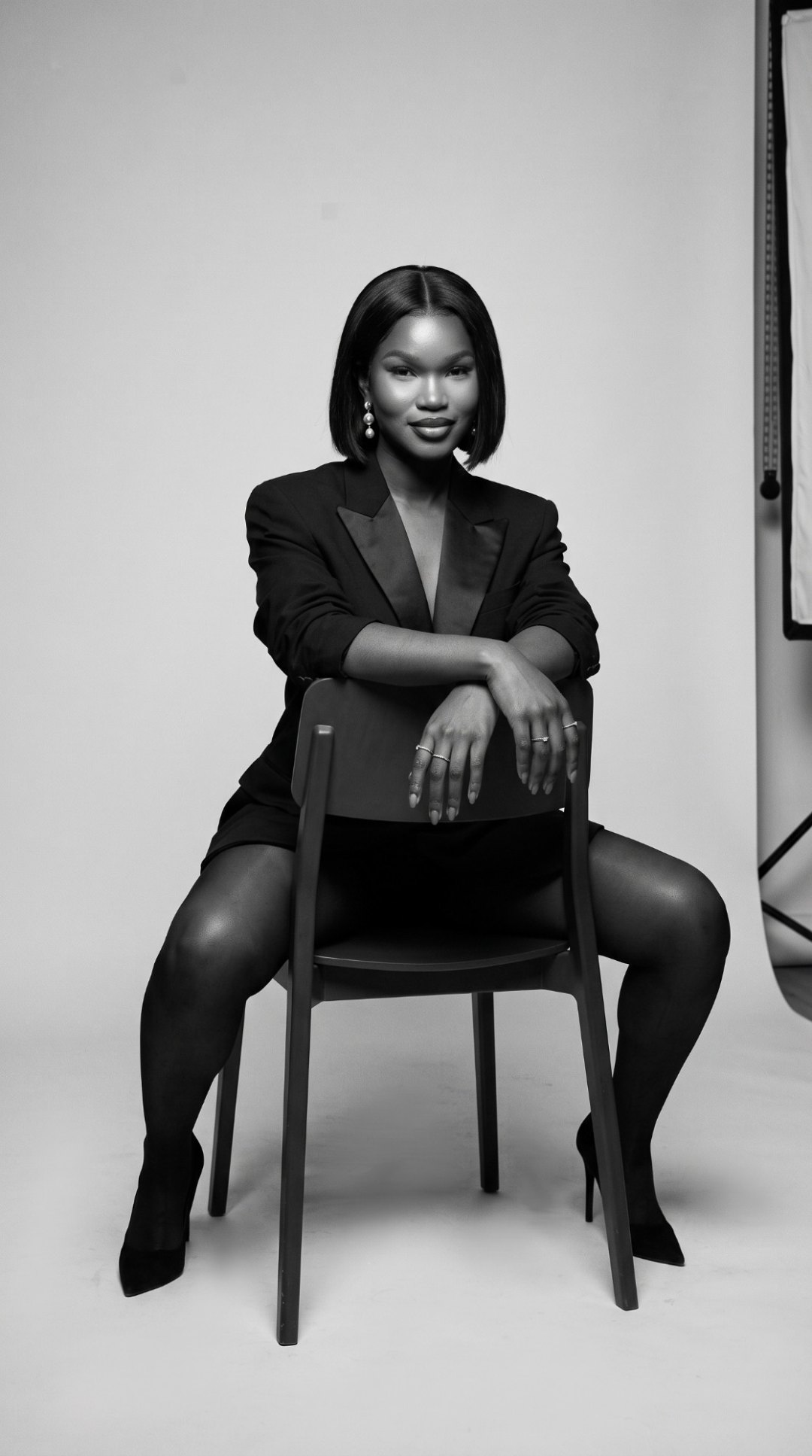 Vicky in a black blazer, black and white portrait